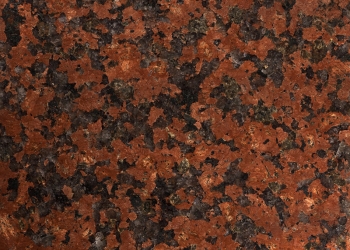 Texture of Red Granite. Dark color.